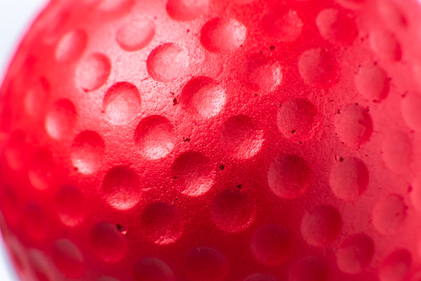 红色橡胶球质地。关闭背景。图片下载