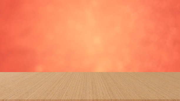 抽象模糊的橙色和金色背景与散景灯和透视木桌面展示，广告，设计产品展示的概念在圣诞和新年快乐的季节概念图片下载