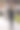 迷人苗条的年轻黑发女子穿着时尚的风衣，黑色的连衣裙和太阳镜在公园里。秋天,黄色的叶子图片下载