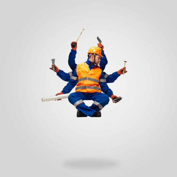 英俊的承包商，多臂建造者悬浮孤立在灰色工作室背景图片下载