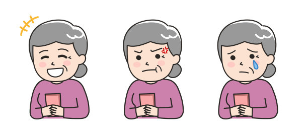 老年妇女使用智能手机时的面部表情。图片下载