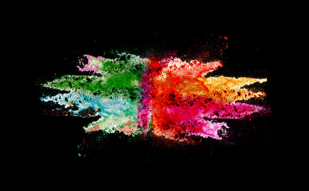 彩色粉末爆炸在黑色背景。图片下载