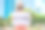 一名妇女戴着医用口罩预防冠状病毒病，手持海报BE HALTHY手写文字孤立在白色。冠状病毒COVID - 19概念图片下载
