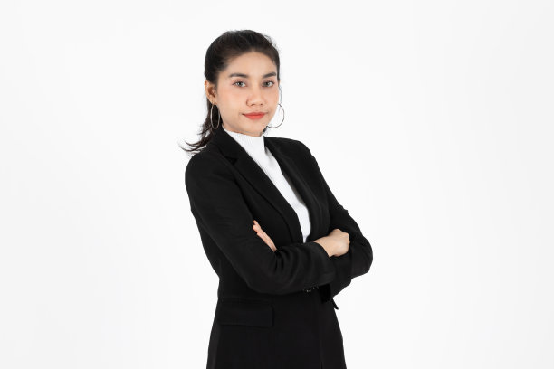 自信的年轻亚洲女商人在白人孤立的背景。图片下载