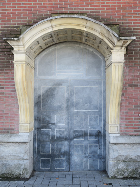 红色砖墙上的纪念性入口图片下载