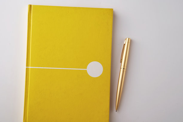 空白黄色笔记本白色背景图片下载