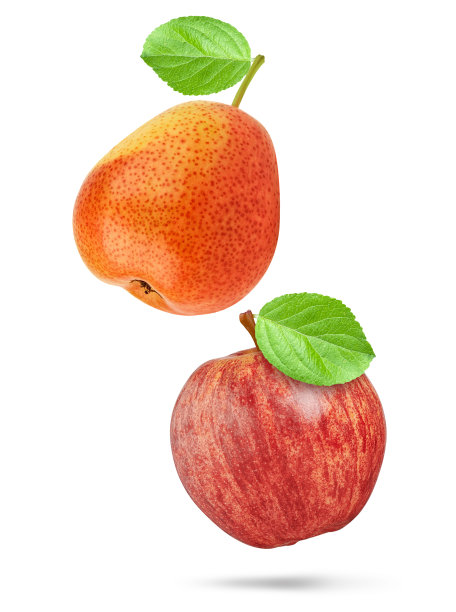 健康食品。分离出绿叶的红苹果和梨图片下载