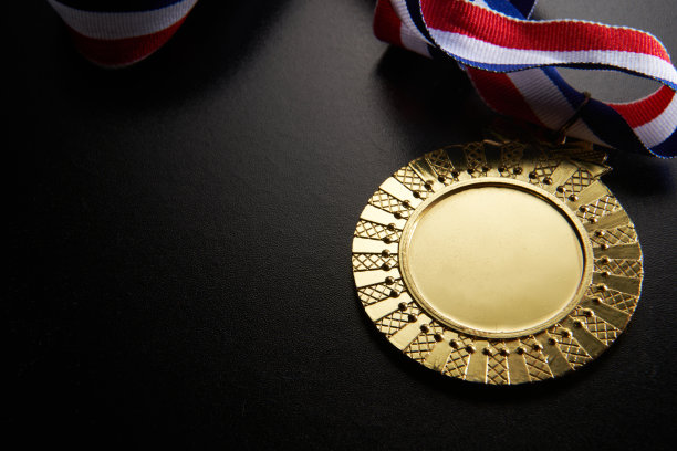 绿色背景上的金牌图片下载