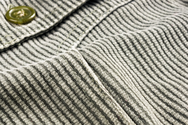 衣服项目石洗棉织物纹理接缝，扣，钮扣和铆钉，宏观图片下载