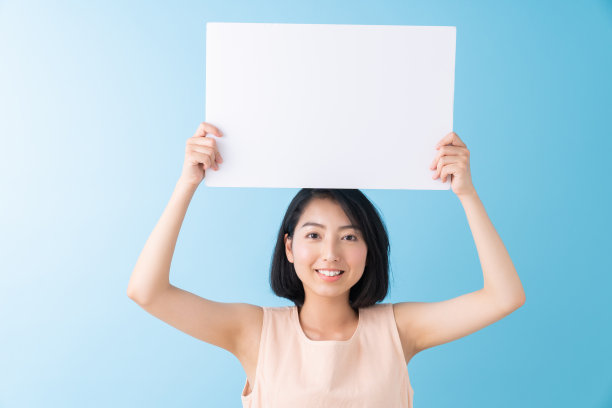 有白板的亚洲女性图片下载