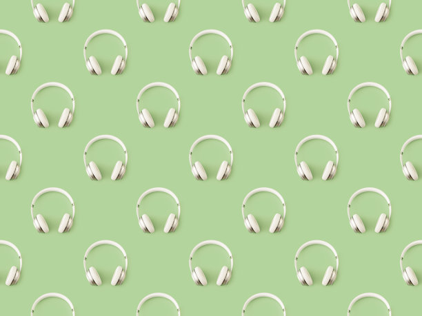 无缝重复耳机模式在绿色背景图片下载