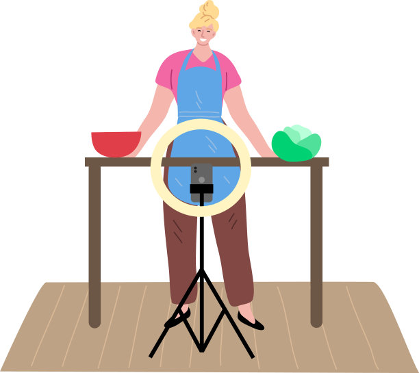 女博主站在厨房里拍视频图片下载