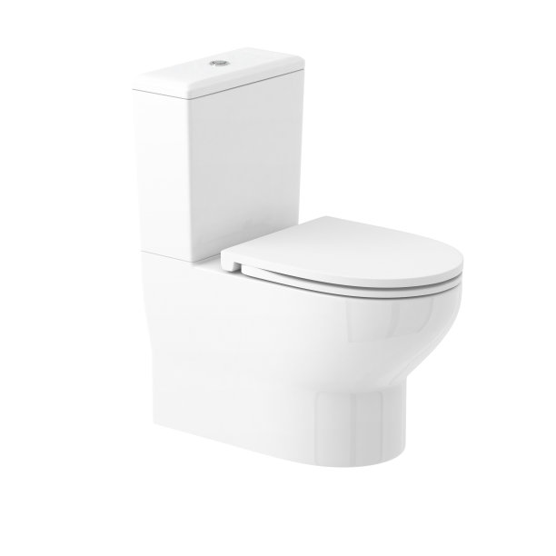 WC。白色陶瓷马桶，带冲水和封闭的座套图片下载