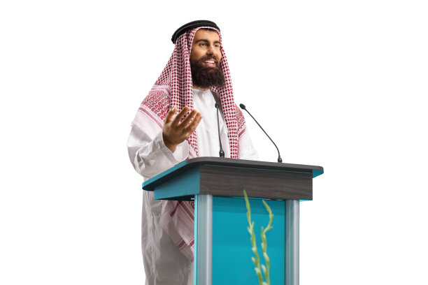 一个阿拉伯人，站在台座上做手势演讲图片下载
