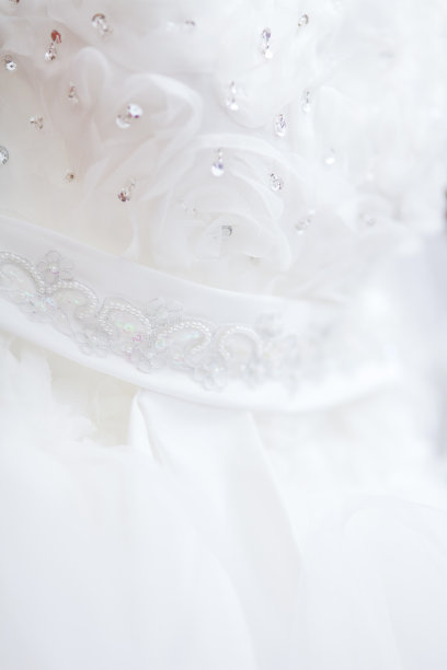 蕾丝婚纱近景，柔焦影像。图片下载
