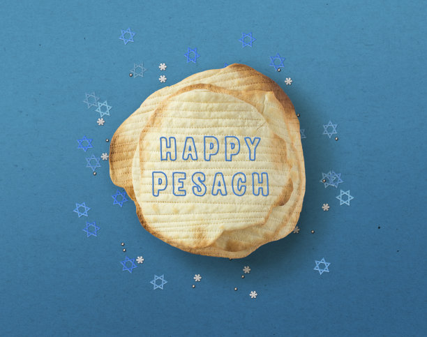 "逾越节快乐"卡片上有鲜花和犹太薄饼。逾越节的愿望。图片下载