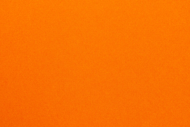 明亮的橙色毛毡织物纹理的高分辨率近景，粗糙的蓬松织物的橙色颜色的背景和壁纸，一个强烈的橙色纹理的毛毡织物与粗糙的触摸图片下载
