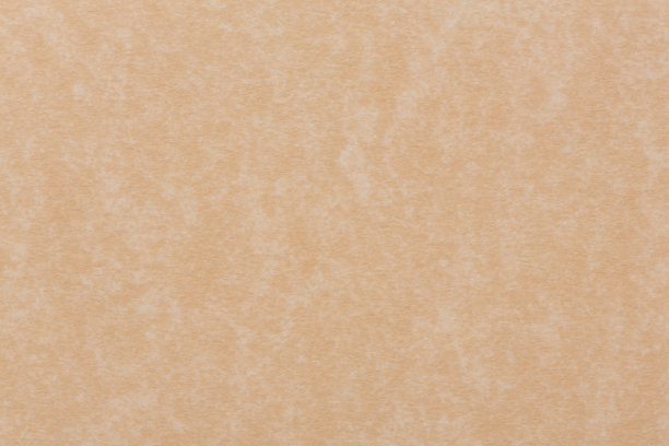 抽象的棕色背景纸或羊皮纸，质地柔软或棕黄色奶油色。图片下载
