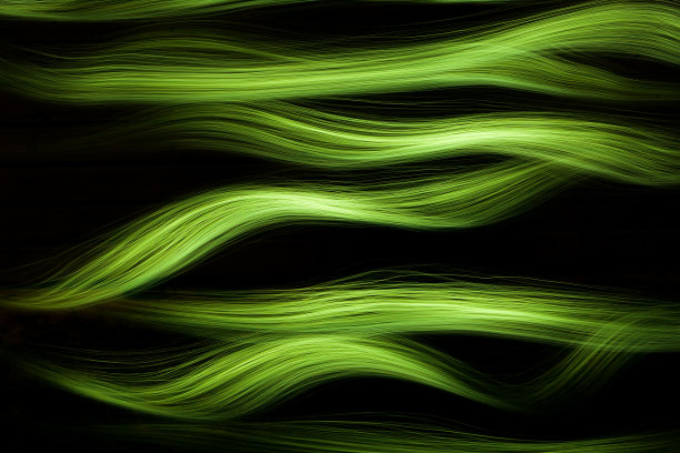 明亮的绿色曲线墙纸。图片下载