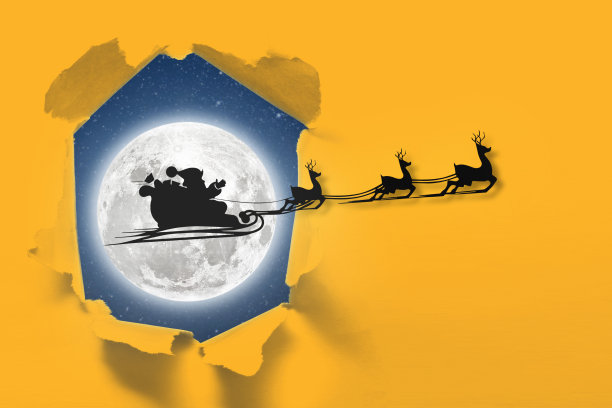 在夜空的背景下，一个飞翔的哥特圣诞老人的剪影。图片下载