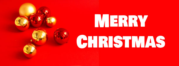 红色和金色的圣诞球在红色的背景图片下载