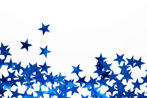 圣诞节边界与蓝星五彩纸屑。新年的假日背景为白色图片下载