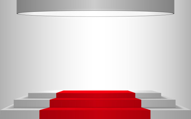 白色的讲台和聚光灯下的红地毯图片下载