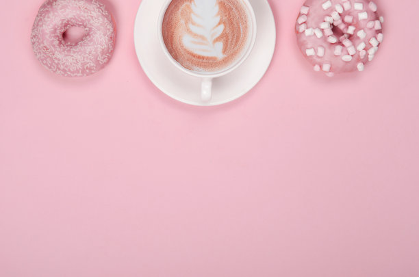 平铺构图与甜甜圈和一杯咖啡图片下载