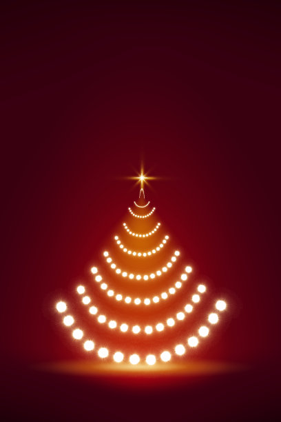 圣诞树孤立在红色模糊的背景。图片下载