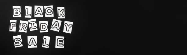 黑色背景的黑色星期五促销文字。黑色和白色字母信息推广横幅。长网页横幅与复制空间。图片下载