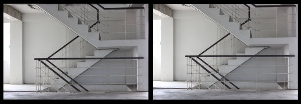 混凝土楼梯是木制扶手。大楼里有梯子。空旷的现代建筑楼梯图片下载