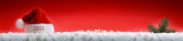 圣诞帽和白雪新年快乐。图片下载