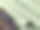 绿色和黑色条纹的布料叠成一堆。特写镜头图片下载