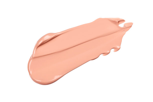 精致的浅米色粉底涂抹在白色背景上。粉色的色调。美丽柔和的BB霜孤立。化妆和皮肤护理的化妆品。美容。特写镜头。图片下载