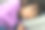 一个亚洲小孩在沙发上打盹图片下载