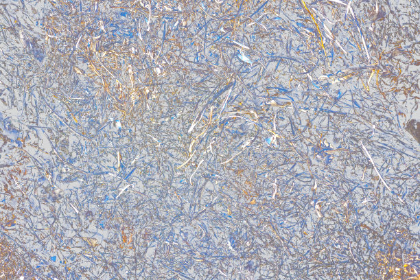 照片的一个独特的抽象背景设计。有曲线和粒子的光滑表面。图片下载