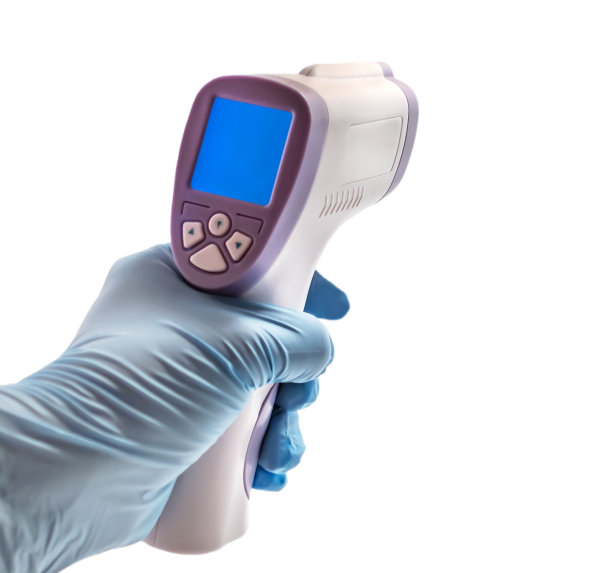 冠状病毒的症状。红外线温度计与蓝色空白屏幕。温度测量装置图片下载