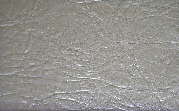 灰色真皮打磨平整的表面，丰富的自然特写图案。图片下载