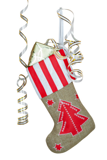 红色圣诞靴与礼物的白色背景图片下载