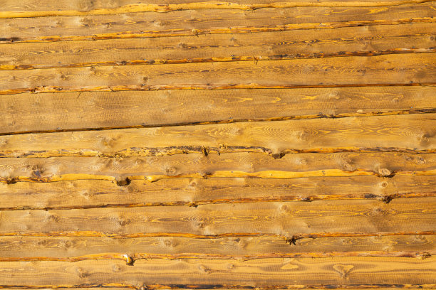 金色的木头的背景。抽象木纹金色图片下载