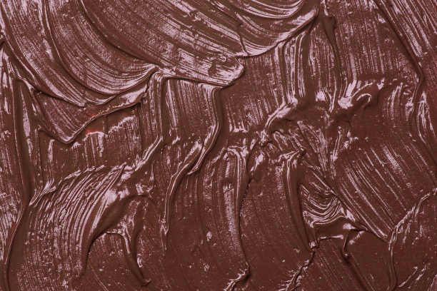 棕色天然化妆脸泥，纹理背景。红色粘土面膜，特写图片下载