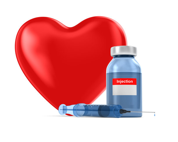 白色背景的医用注射器和心脏。孤立的3D插图图片下载