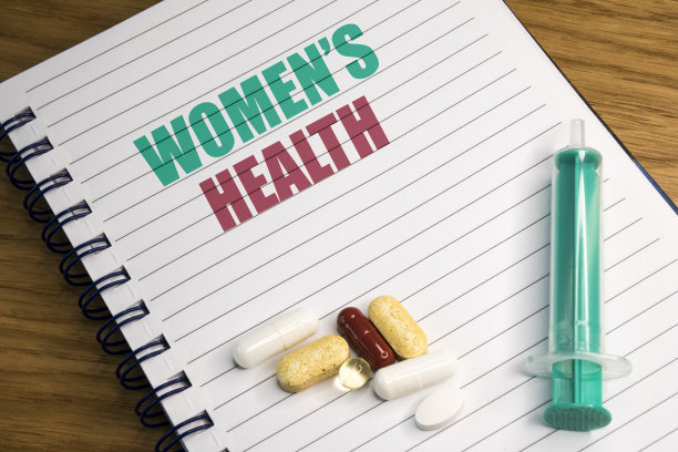 “女人的健康”写在条纹笔记本上图片下载
