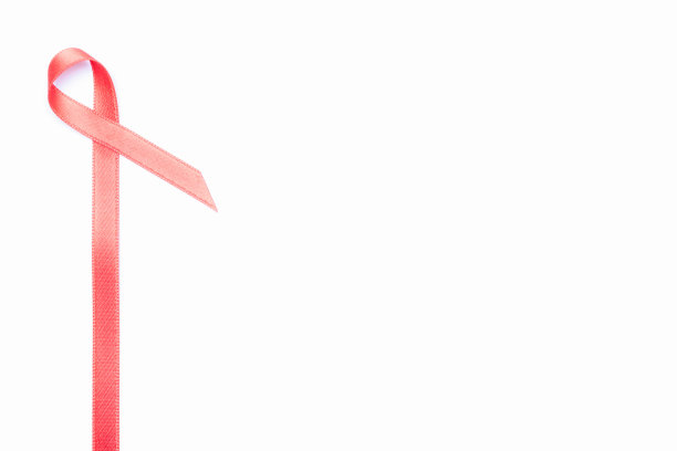 Hiv病毒。红丝带象征世界艾滋病日孤立在白色背景上。意识有助于预防癌症。健康,医学信号。副本的空间。图片下载