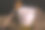 牛奶和蜂蜜在一个杯子在黑暗的背景。特写镜头。图片下载
