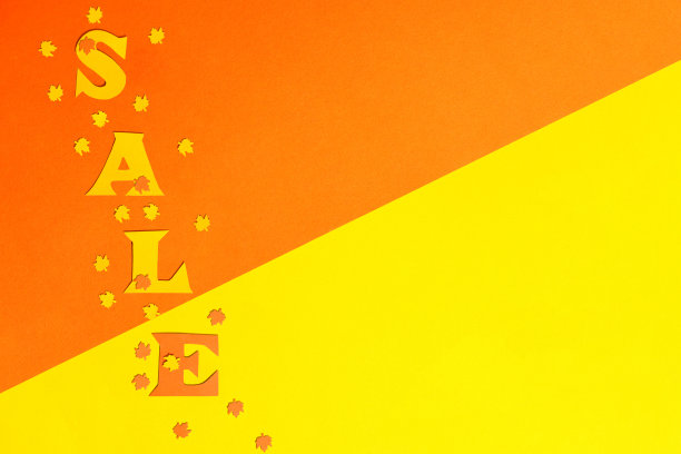 纸张背景以黄色和橘色对角线划分，上面的字销售图片下载