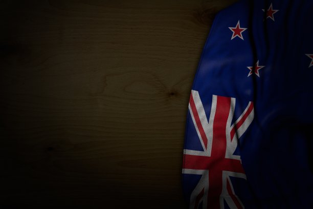 可爱的新西兰国旗的深色照片与大折叠的深色木材与自由的地方文字-任何盛宴旗3d插图图片下载