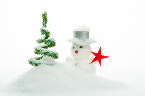 小圣诞树与雪人的象征孤立在白色图片下载
