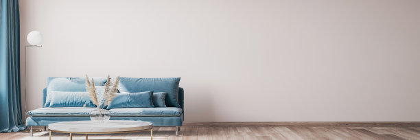 时尚现代的客厅内饰趋势家居配件，大理石茶几，干花和蓝色沙发。图片下载