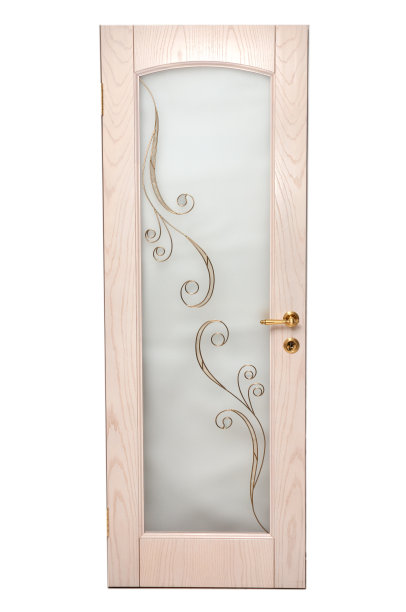 这扇门是用浅色木材制成的，玻璃镶板上有白色背景上的图案图片下载